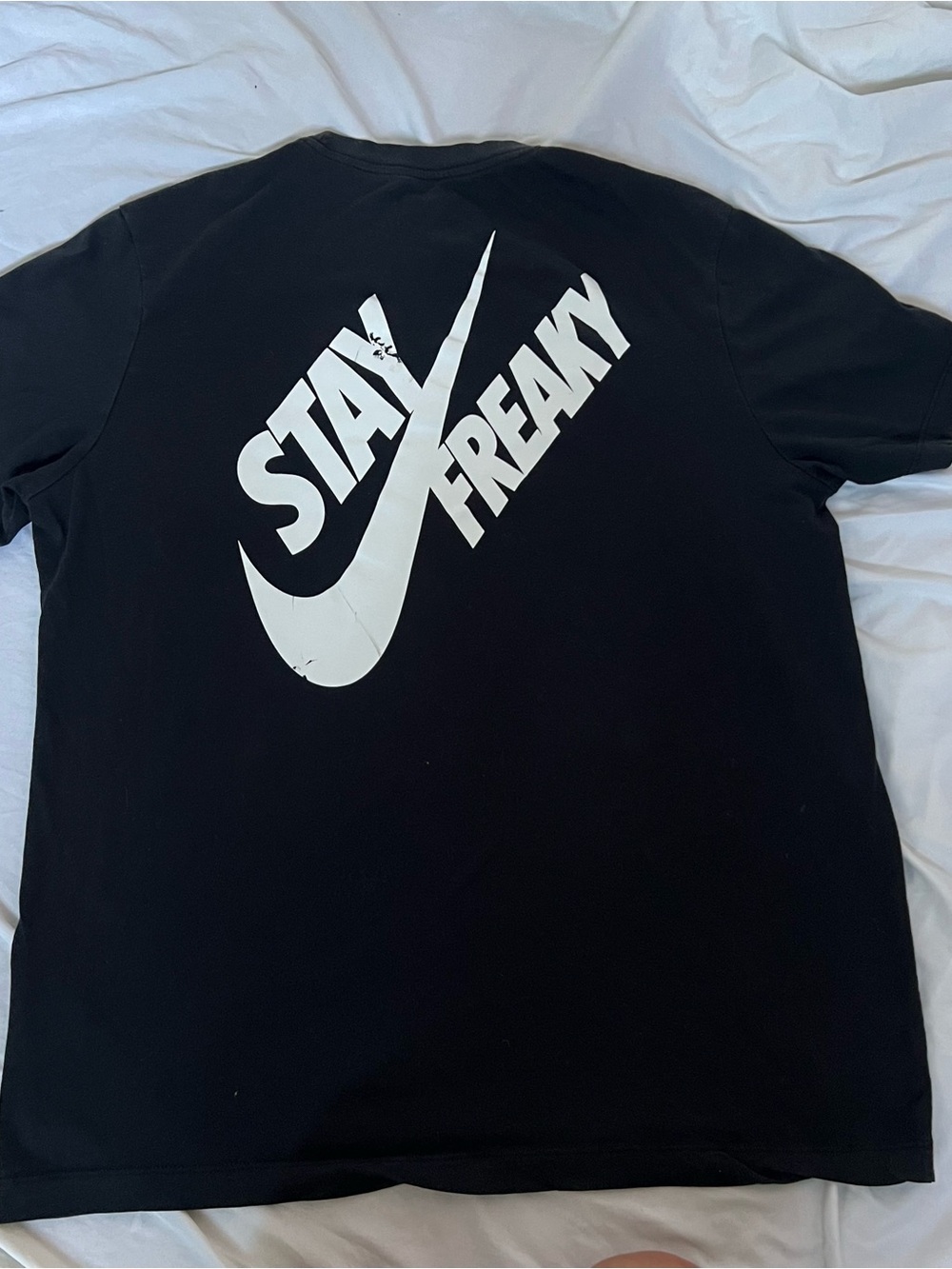 Nike Black Short Sleeve Tee with White 'Stay Freaky' Swoosh Graphic
